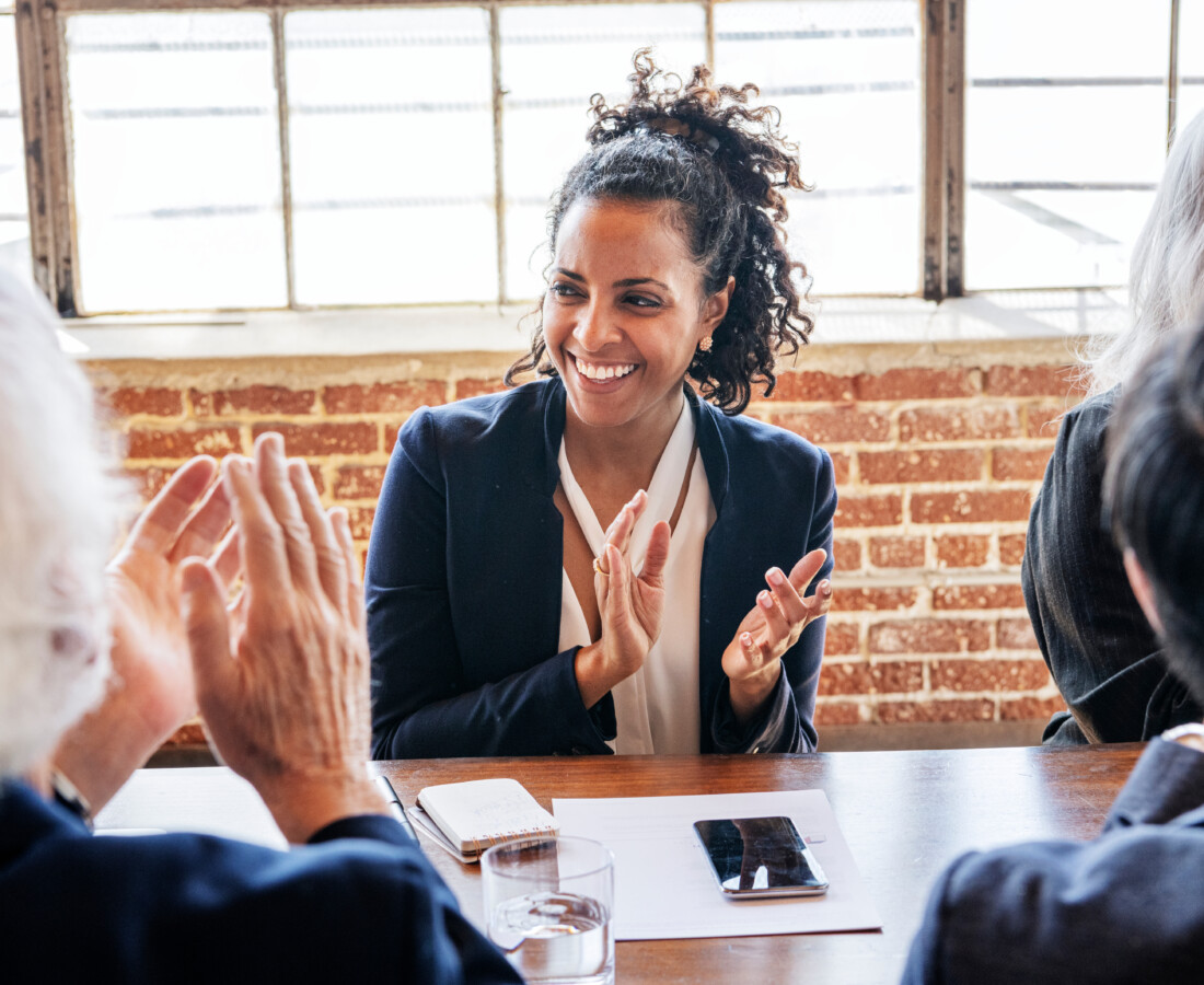 Business people clapping in the meeting