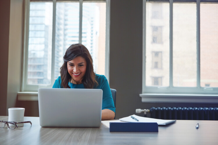 Shot of a businesswoman using a laptop in an office