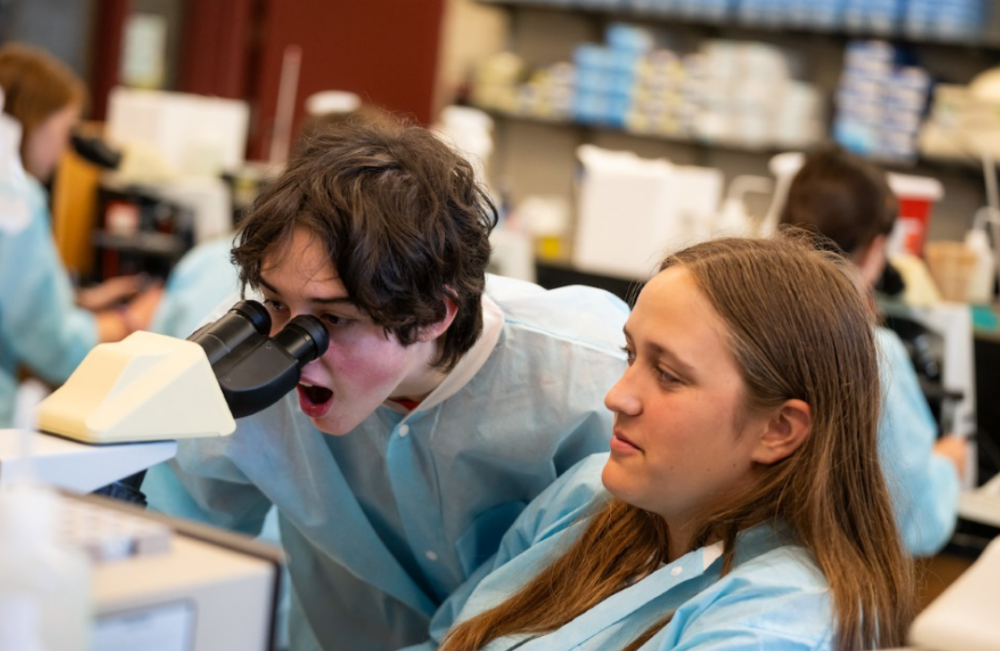 UVM students in a lab setting